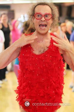 Richard Simmons The flamboyant fitness guru arrives at his aerobics dance studio dressed in a red feathered leotard and wearing...