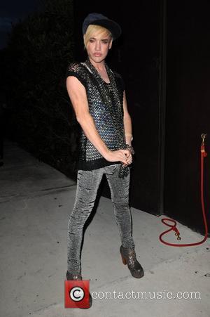 Richie Rich attends a portrait unveiling at the Women In Cages exhibit at Cafeina Lounge Miami, Florida. - 11.08.11