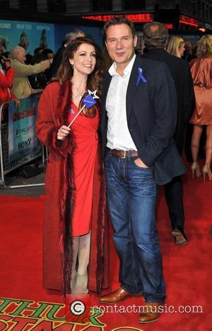 Richard Arnold and Emma Samms 'Arthur Christmas' UK premiere held at the Empire Leicester Square - Arrivals. London, England -...