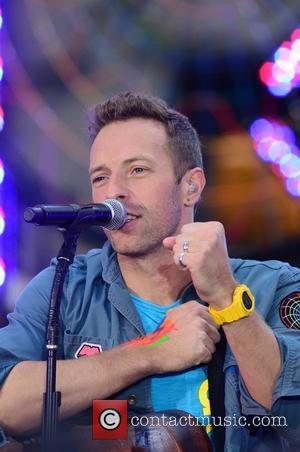 Chris Martin Coldplay performing live on the 'Today' show as part of their Toyota Concert Series at Rockefeller Plaza New...