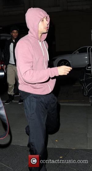 Rapper, Dappy aka Costadinos Contostavlos of N-Dubz arrives at his Manchester Hotel wearing a pink hoodie. Manchester, England - 16.11.11