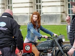 Karen Gillan rides on a motorcycle on the set of the BBC sci-fi series Doctor Who filming on location at...