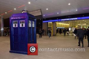 Bemused shoppers walk past the Doctor Who Tardis outside Westfield Stratford City station London, England - 21.11.11