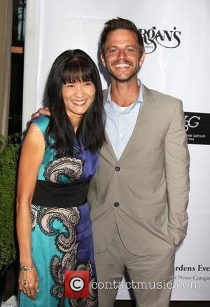 Suzanne Whang and Carmine Giovinazzo