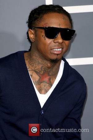 Lil Wayne aka Dwayne Carter, Jr. The 53rd Annual GRAMMY Awards at the Staples Center - Red Carpet Arrivals Los...