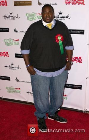 Quinton Aaron  The 80th Anniversary of The Hollywood Christmas Parade benefiting Marine Toys For Tots on Hollywood Boulevard Hollywood,...