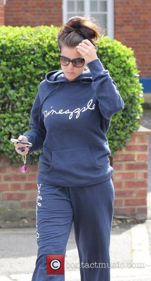 Imogen Thomas is seen leaving her home in a workout suit and sunglasses London, England - 18.06.11