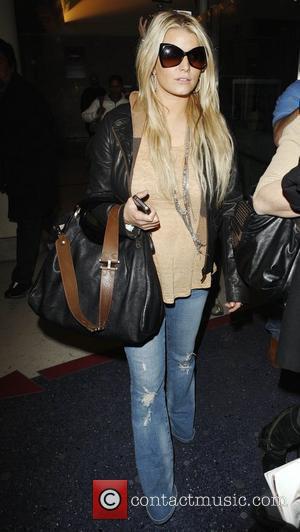 Jessica Simpson arrives at LAX airport Los Angeles, California - 26.03.11