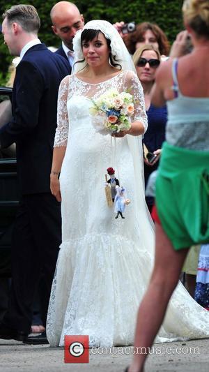 Lily Allen leaving the church The wedding of Lily Allen and Sam Cooper Cranham, Gloucestershire - 11.06.11