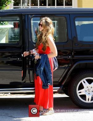 Katherine Schwarzenegger returning to her car after shopping with her mother on Melrose Place in West Hollywood Los Angeles, California...