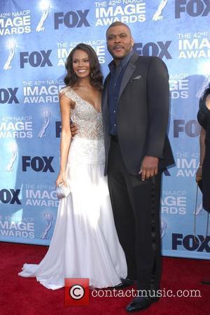 Tyler Perry and wife 42nd NAACP Image Awards at The Shrine Auditorium - Arrivals  Los Angeles, California, USA -...