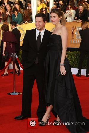 Mark Wahlberg and Wife The 17th Annual Screen Actors Guild Awards (SAG Awards 2011) held at the Shrine Auditorium &...