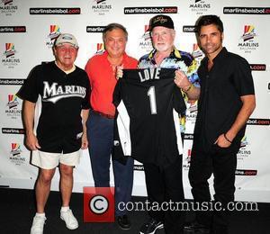 Bruce Johnston, owner of the Florida Marlins Jeffery Loria, Mike Love and John Stamos The Beach Boys with special guest...