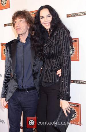 Mick Jagger and L 'Wren Scott  Members of Sir Mick Jagger's new supergroup Superheavy celebrate the release of their...