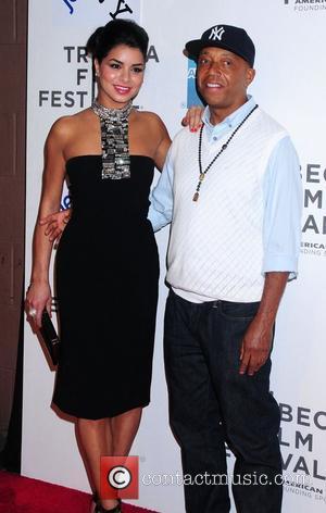 Rima Fakih and Russell Simmons 2011 Tribeca Film Festival Premiere of 'Last Night' at the BMCC Theater - Arrivals New...