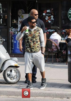 Usher grabs a refreshment in Yorkville Toronto, Canada - 13.05.11