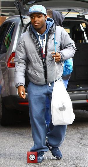 X Factor finalist Derry Mensah of The Risk arriving at rehearsals London, England - 04.11.11