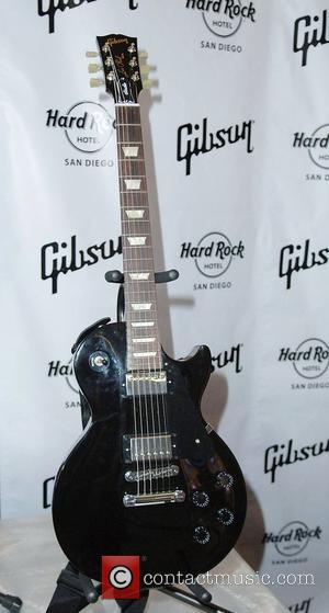 A Gibson Les Paul Studio model...