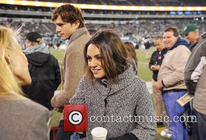 Must Be Love? Ashton Kutcher And Mila Kunis Look Besotted At Lakers Game (Pictures)