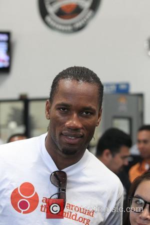 Didier Drogba Professional football players from the English Premier League host an event at Eaglerider Motorcycles in support of 'armsaroundthechild.org'...