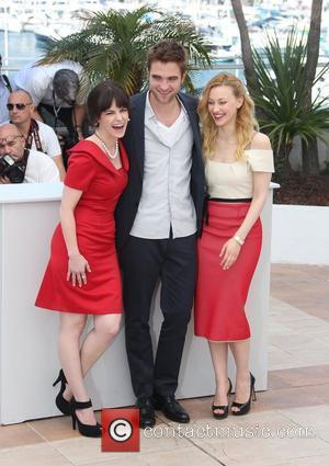 Sarah Gadon, Robert Pattinson and Emily Hampshire 'Cosmopolis' photocall during the 65th annual Cannes Film Festival Cannes, France - 25.05.12