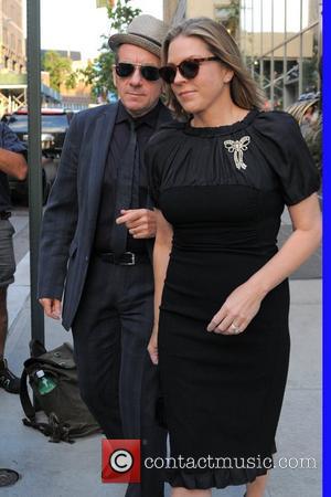 Elvis Costello and wife Diana Krall heads to a their car outside the Trump Soho Hotel New York City, USA...