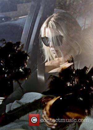 New mum Jessica Simpson  is photographed in her car as she leaves her personal trainer's house. Los Angeles, California...