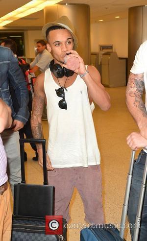 Aston Merrygold JLS arrive at Miami International Airport Miami, Florida - 05.05.12