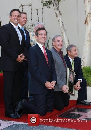 Eric Garcetti, Randy Newman, Neil Diamond Neil Diamond is honoured with a star on the Hollywood Walk of Fame, held...