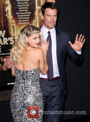 Josh Duhamel and Stacy Ferguson, aka 'Fergie' Los Angeles premiere of 'New Year's Eve' at Grauman's Chinese Theatre. Hollywood, California...