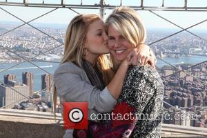 Olivia Holt with her mom Kim Holt Disney star Olivia Holt attends a photocall on the 86th-floor observation deck of...