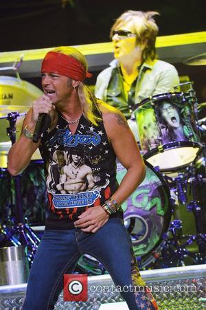 Bret Michaels and Rikki Rockett Poison performs during the Rock of Ages Tour 2012 at the Bank Atlantic Center...
