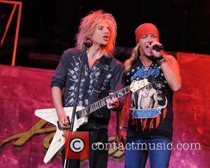 C.C. DeVille and Bret Michaels Poison performs during the Rock of Ages Tour 2012 at the Bank Atlantic Center...