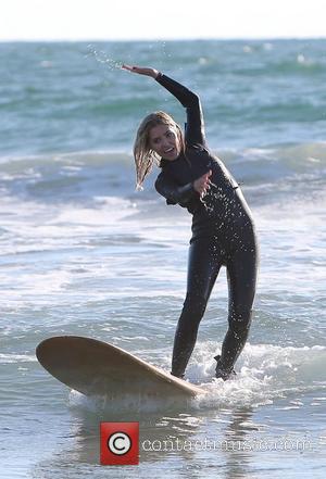 Mollie King  The Saturdays enjoy a surfing lesson on Venice Beach. Los Angeles, California - 10.10.12