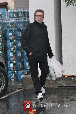 Tim Curry out shopping at Bristol Farm Foods wearing an oversized black jumper and white trainers Los Angeles, California -...