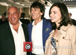 Sir Phillip Green and Ronnie Wood with Sally Humphreys High street retailers catwalk show to celebrate the British Fashion Council's...