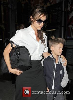 Why Won't Victoria Beckham Smile? She's Blaming The World Of Fashion