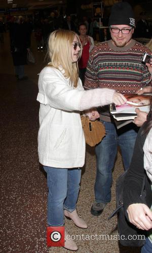 Dakota Fanning - Celebrities arrive at Salt Lake City International...