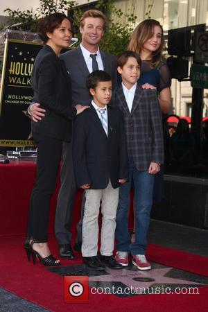 Simon Baker, Rebecca Rigg, Stella Breeze Baker, Claude Blue Baker and Harry Friday Baker - Simon Baker is honoured with...