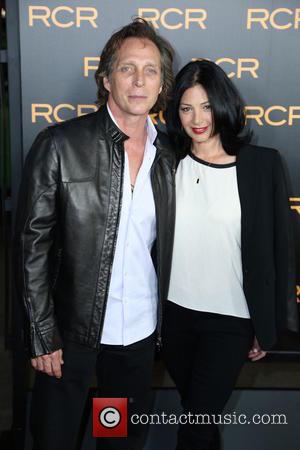 William Fichtner and Kimberly Kalil - Los Angeles premiere of 'Phantom' at the Chinese Theatre - Arrivals - Los Angeles,...