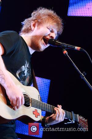 Falling For Taylor Swift? 'Stud' Ed Sheeran Takes Tumble On Stage