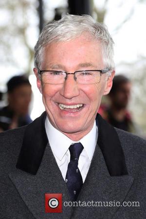 Paul O'Grady - The Tric Awards 2014 held at the Grosvenor House Hotel - Arrivals - London, United Kingdom -...