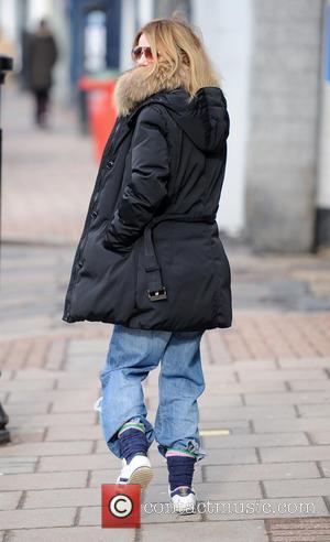 Geri Halliwell - Geri Halliwell walks her daughter Bluebell to school - London, United Kingdom - Monday 18th March 2013