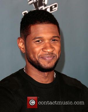 Usher Shares Warm Embrace With Ex-Wife Following Court's Decision To Deny Her Primary Custody Of Children