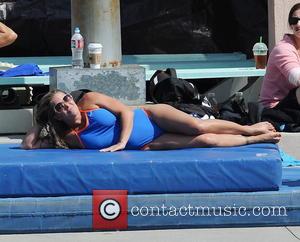 Nicole Eggert - Super Model Katherine Webb continued her diving practice with co stars Nicole Eggert and Drake Bell for...