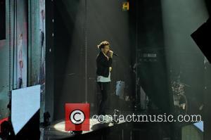 One Direction and Louis Tomlinson - One Direction performing in concert at the LG Arena - Birmingham, United Kingdom -...