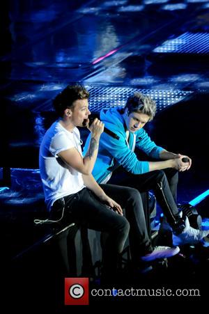 One Direction, Niall Horan and Louis Tomlinson - One Direction performing in concert at the LG Arena - Birmingham, United...