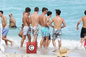 Patrick Schwarzenegger - Patrick Schwarzenegger enjoys a day at the beach with friends - Miami, Florida, United States - Sunday...