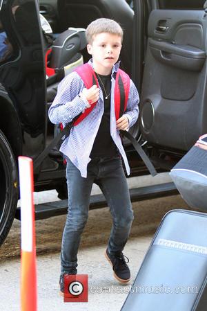 Brooklyn - Victoria Beckham At LAX