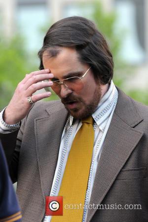 Christian Bale - The cast of 'American Hustle' filming scenes on location in Manhattan - New York City, NY, United...